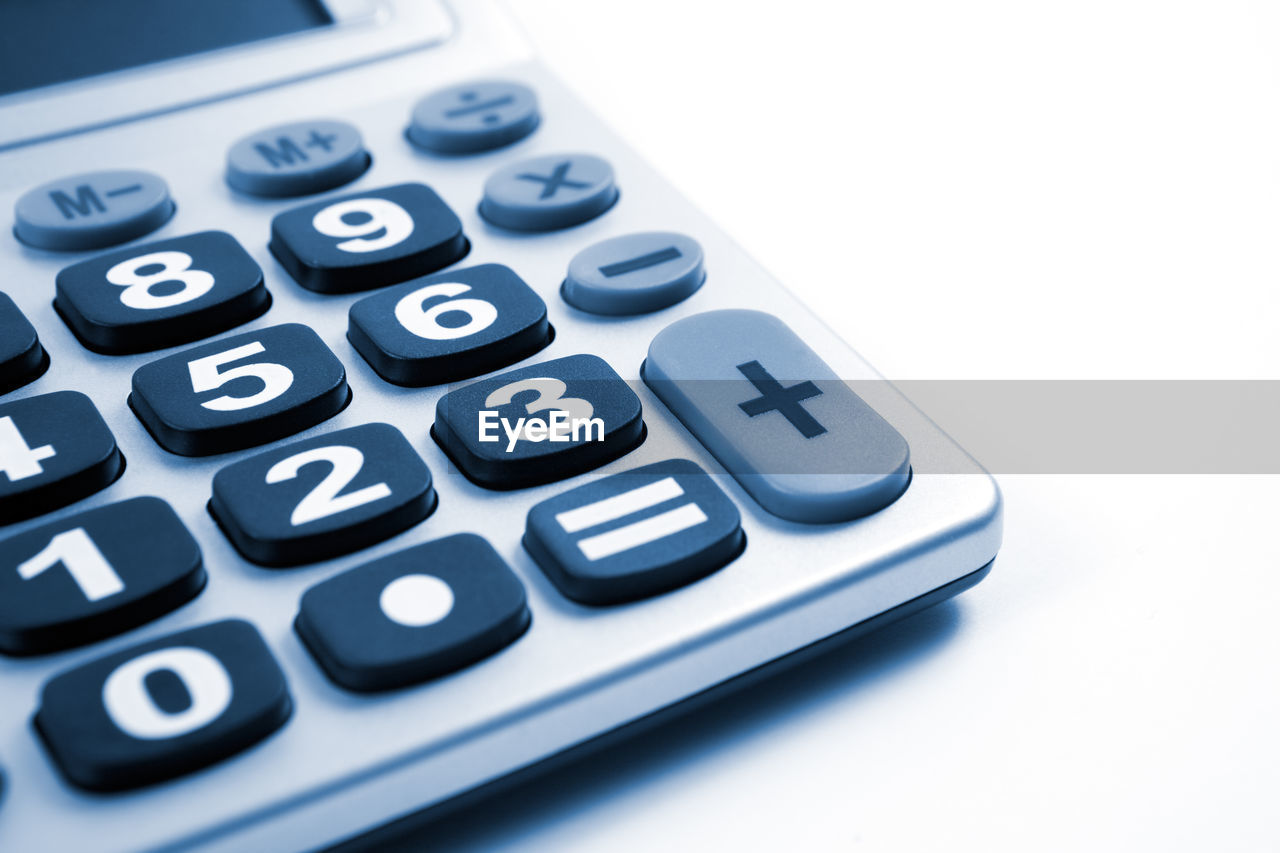 Close up image of calculator isolated in white