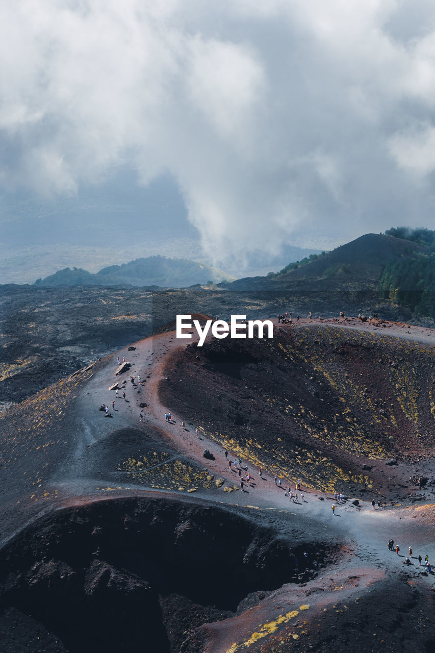 Aerial view of landscape against sky and craters of a volcano 