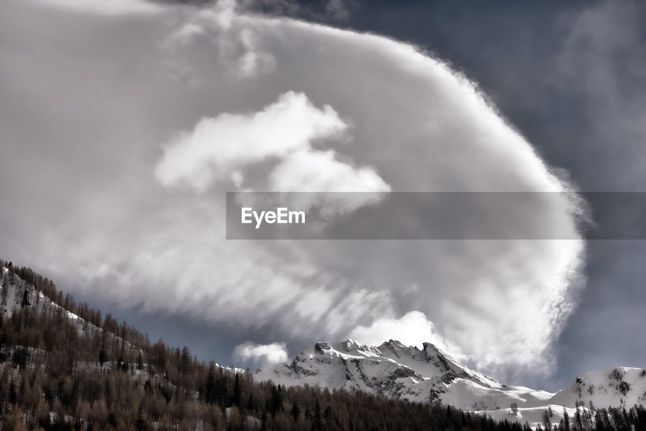 scenic view of snow covered mountain against sky