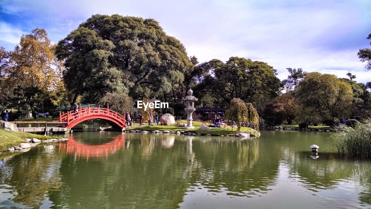 Bridge over lake against sky