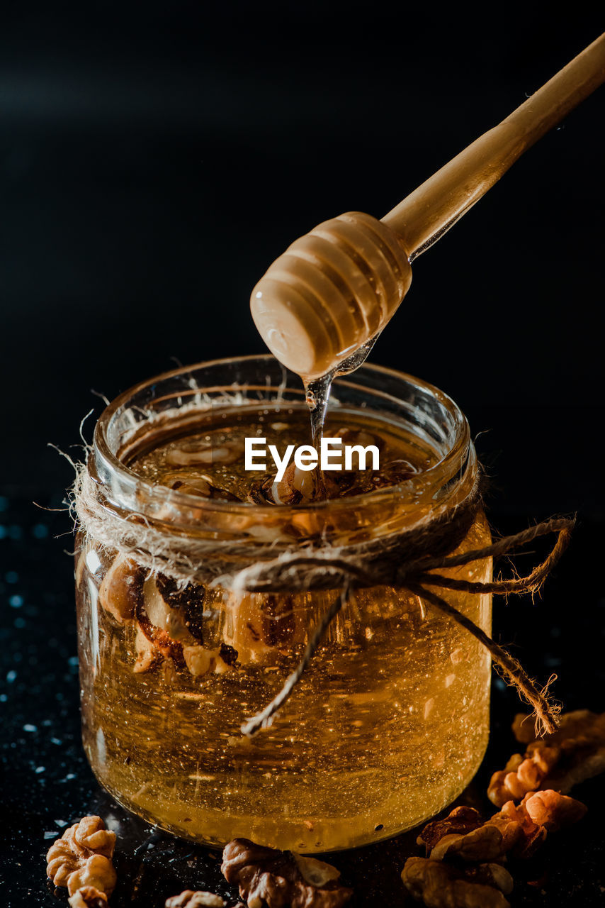 CLOSE-UP OF DRINK IN GLASS JAR