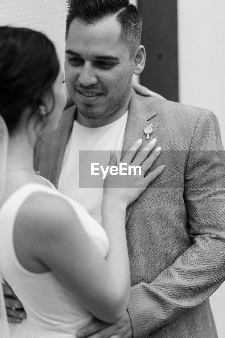 adult, two people, men, women, love, young adult, togetherness, black and white, emotion, positive emotion, smiling, happiness, female, indoors, portrait, person, bride, waist up, monochrome photography, business, lifestyles, embracing, romance, monochrome, married, jewelry, bonding, cheerful