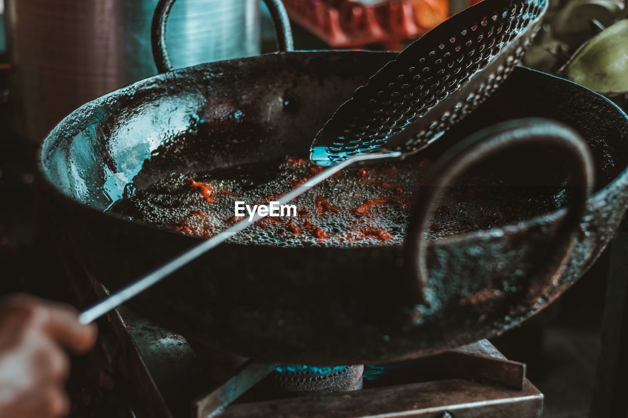 Close-up of person preparing food