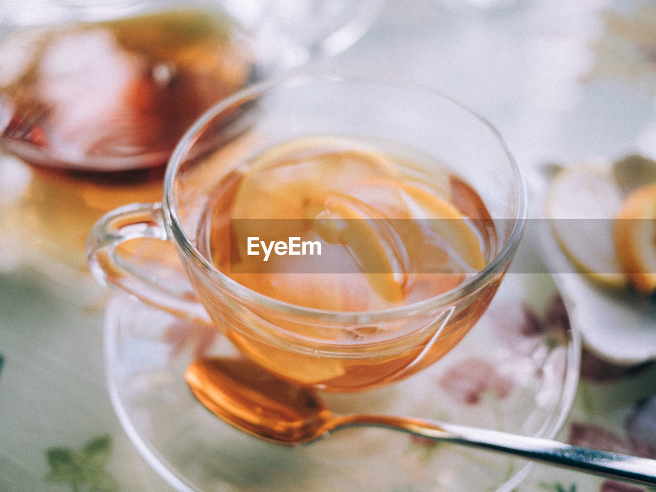 High angle view of tea with fruit slices in cup