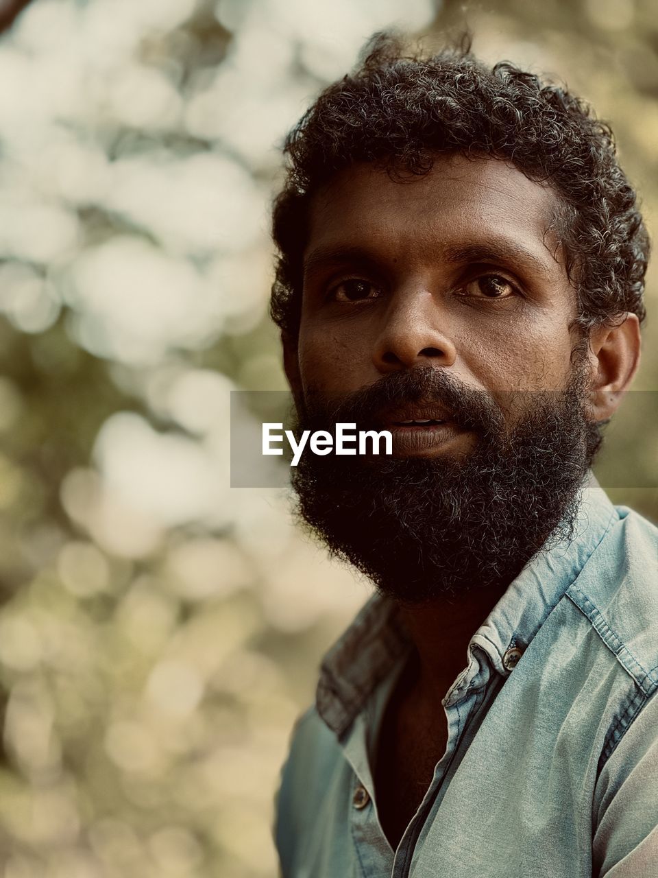 portrait of young man looking away