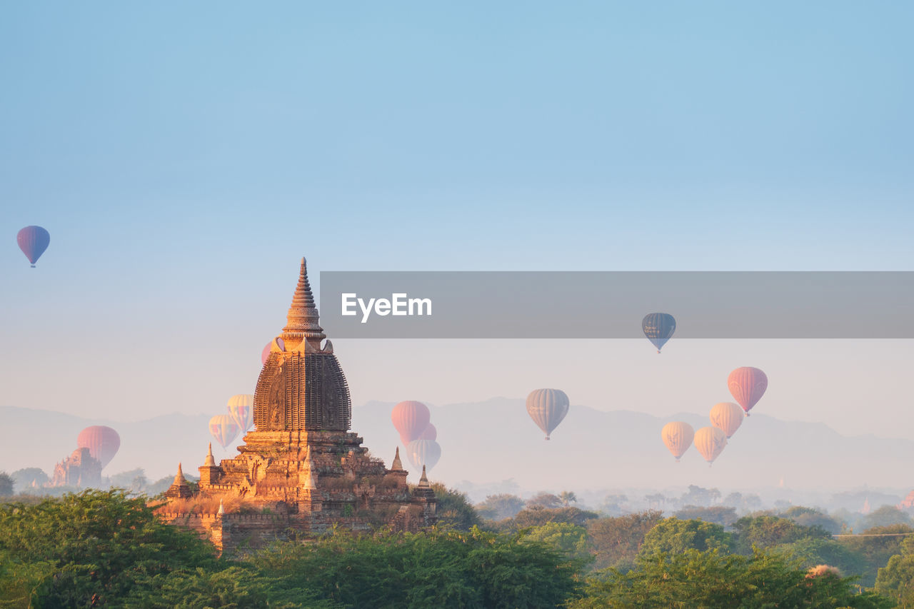 HOT AIR BALLOONS AGAINST SKY