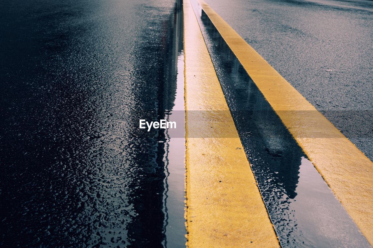 Full frame shot of wet street during rainy season