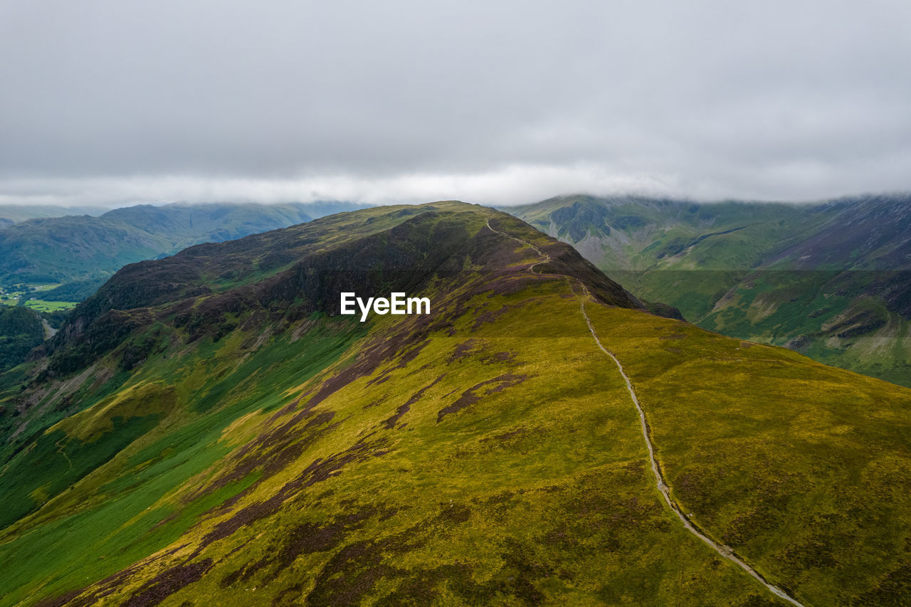 Aerial summer view in cloudy catbells walking route, lake district, united kingdom
