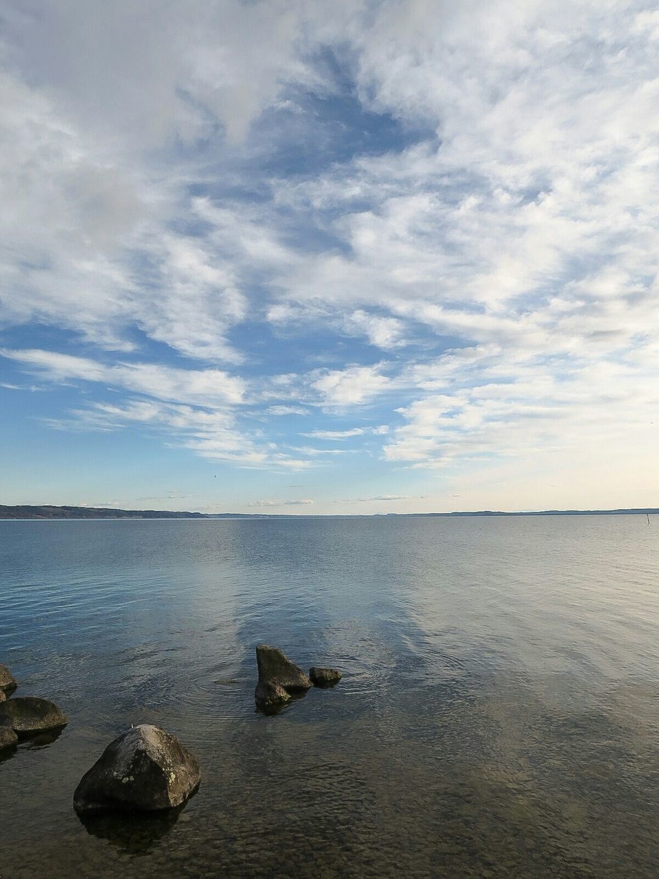 View of sea against cloudy sky