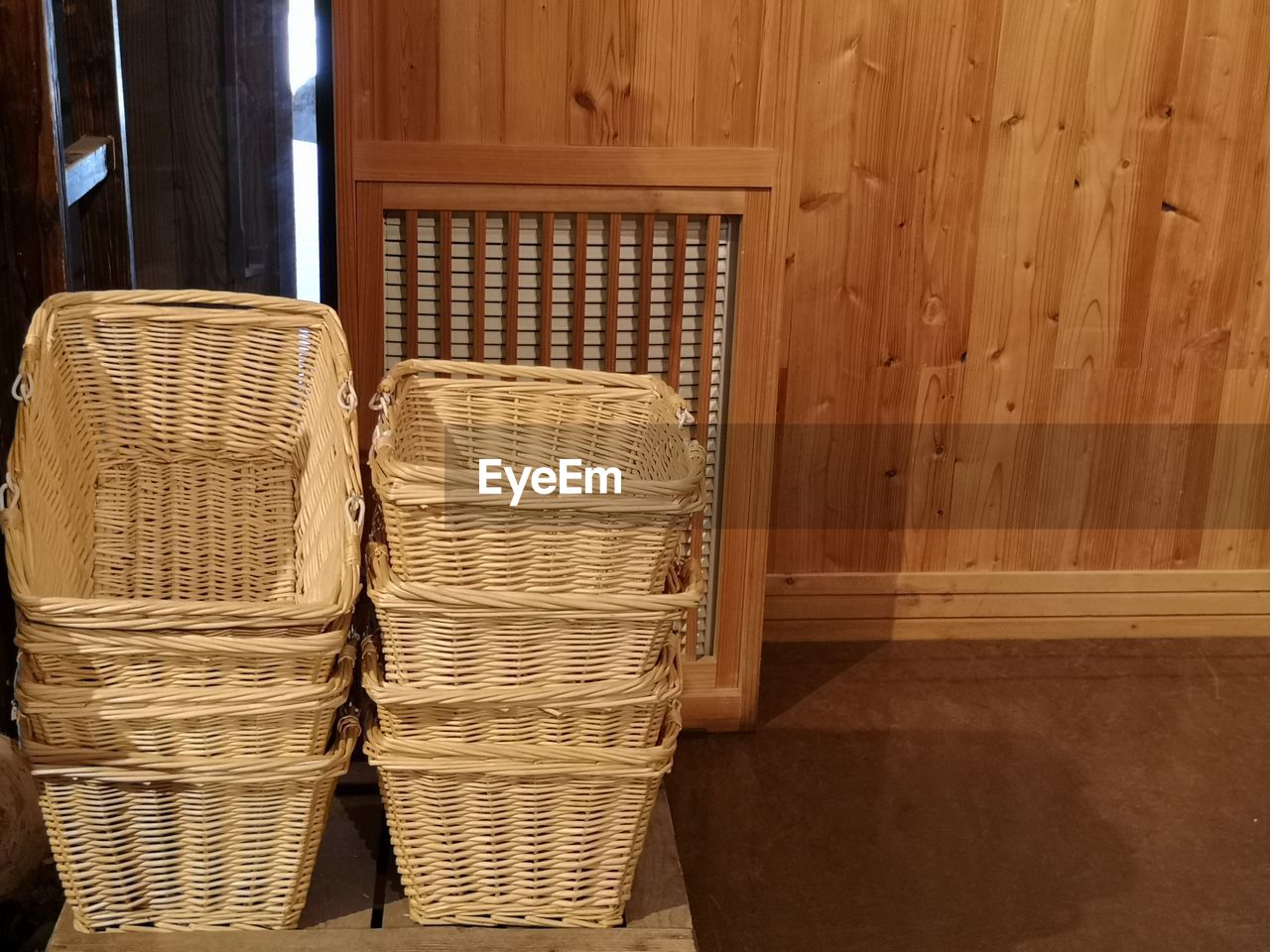 High angle view of baskets stacked on floor at home