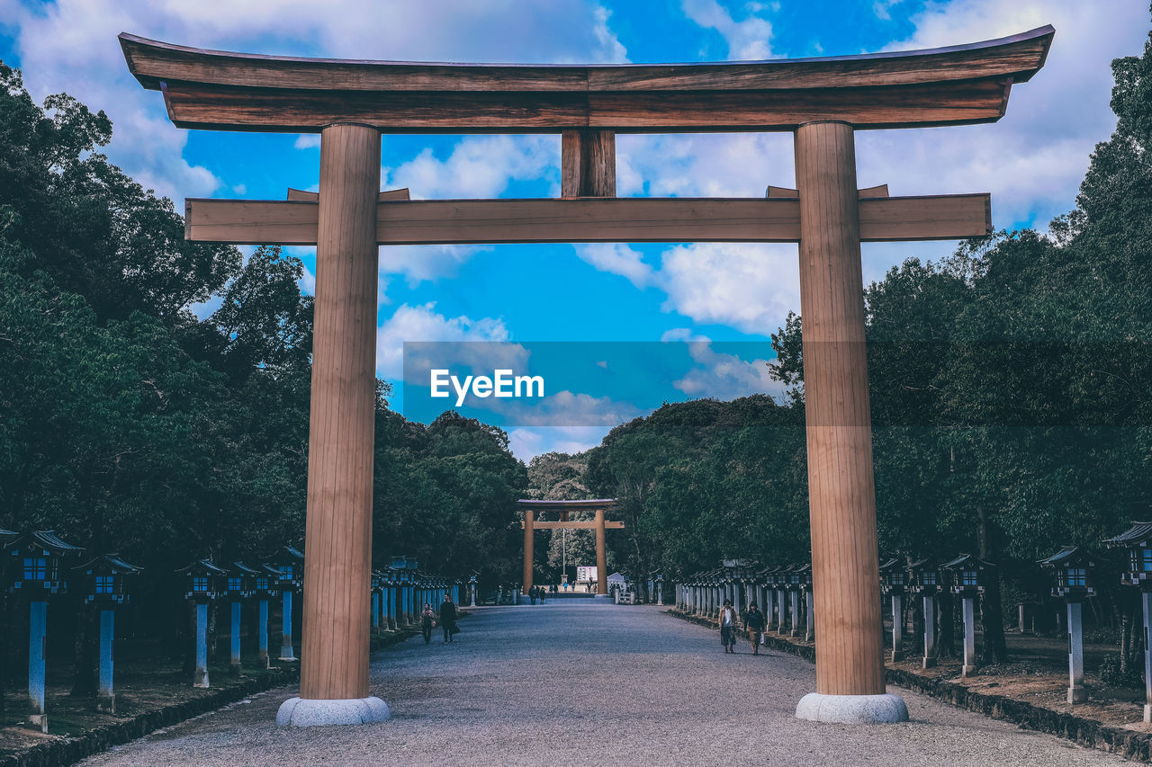 Panoramic view of temple and building against sky