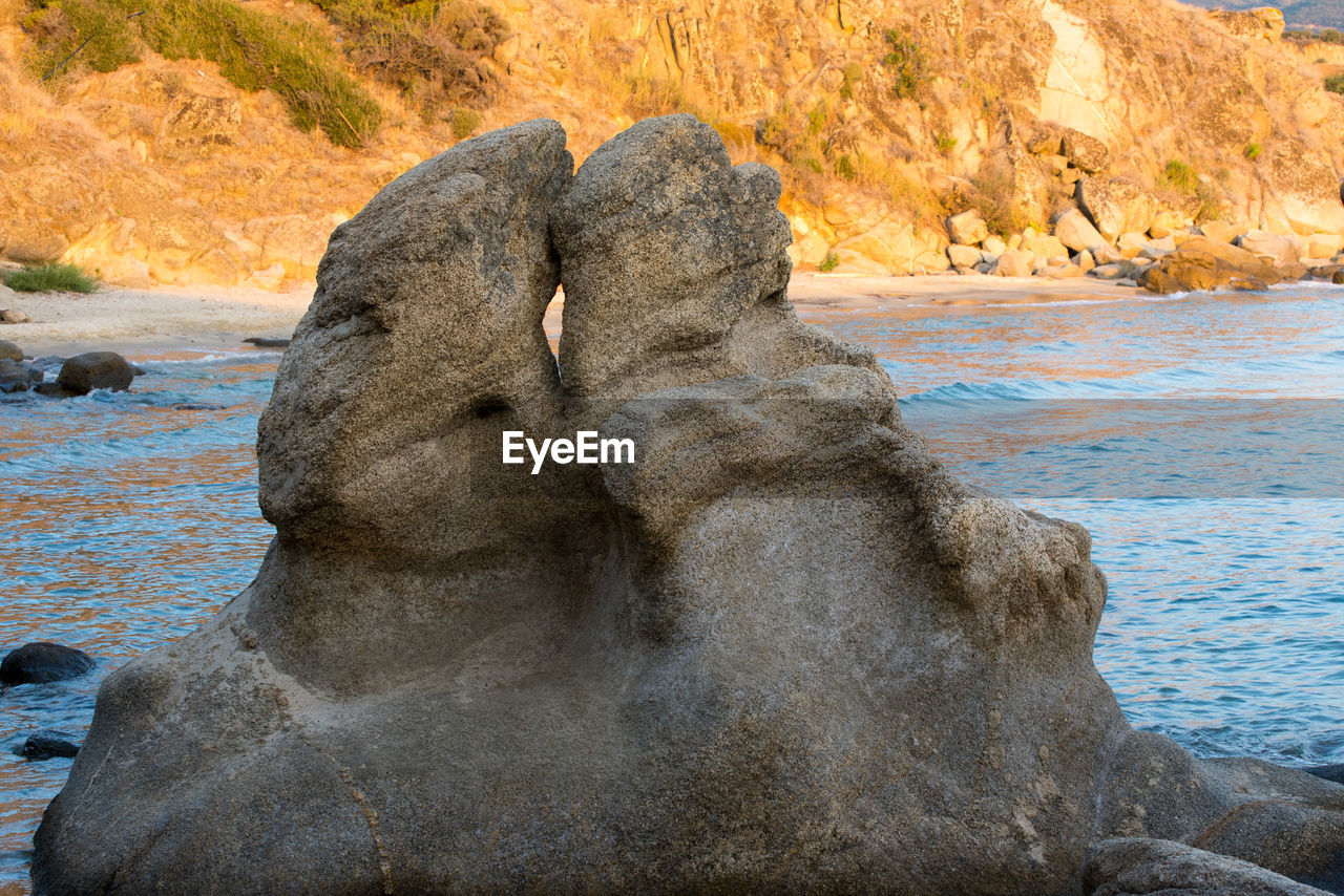 ROCK FORMATION ON BEACH