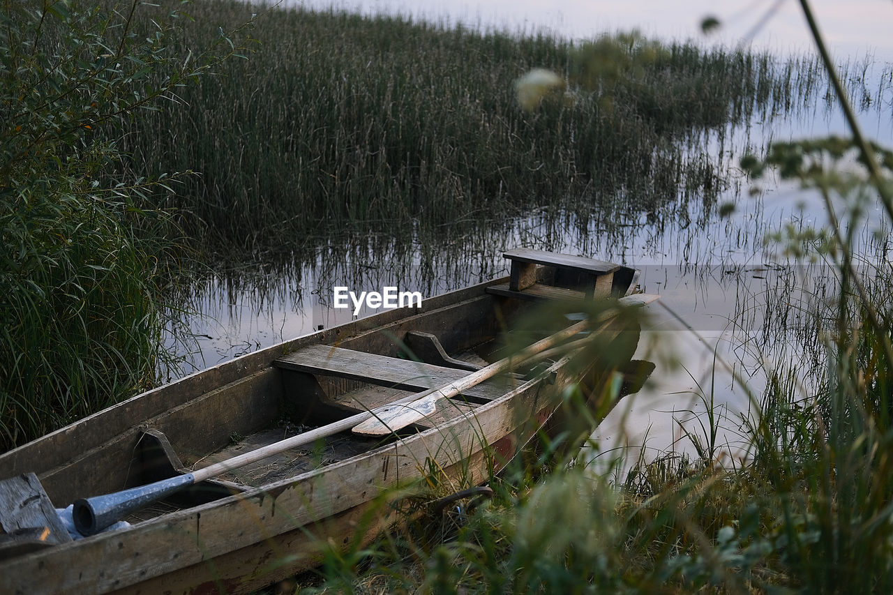 ABANDONED BOAT ON LAND