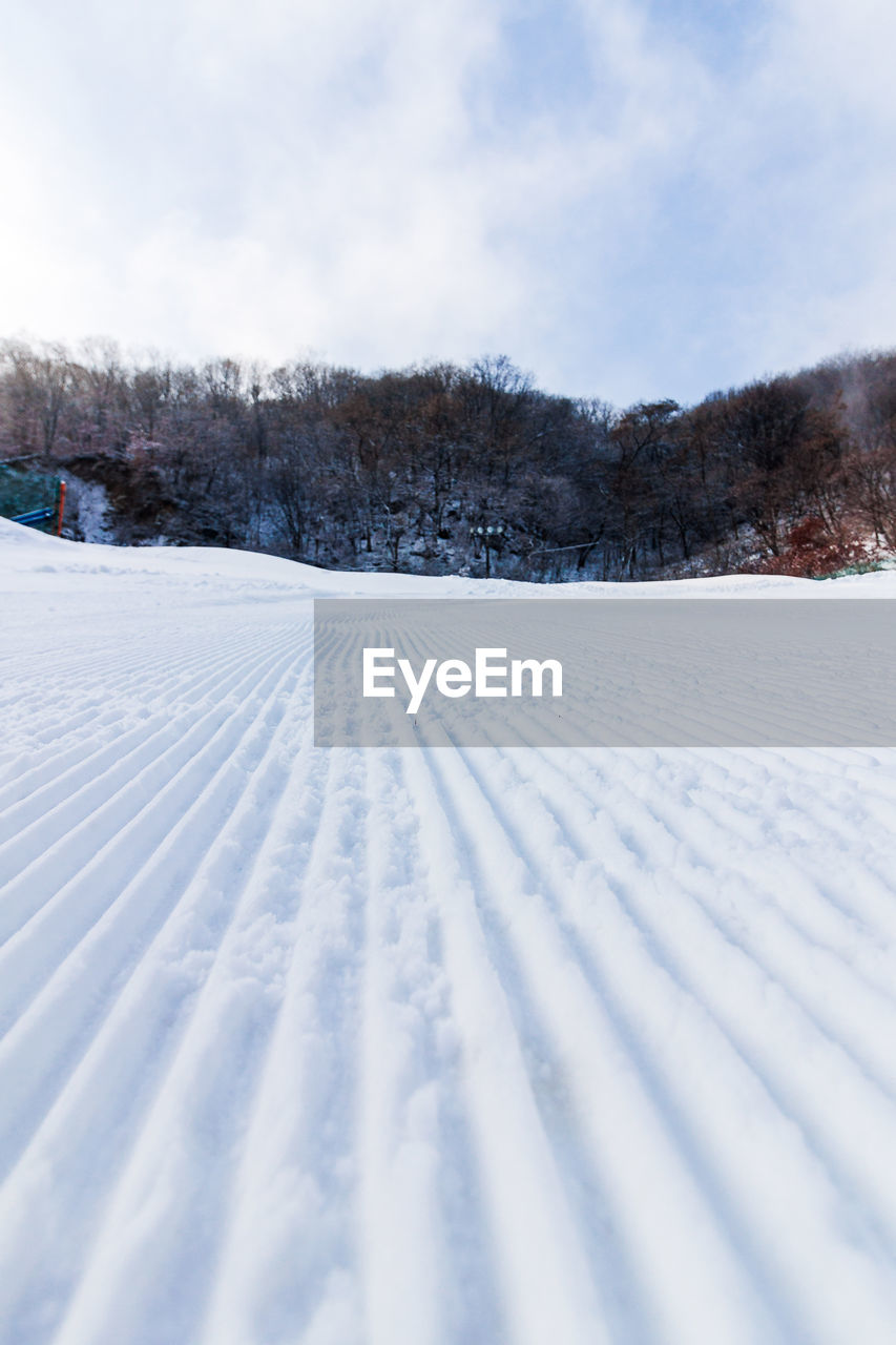 SCENIC VIEW OF SNOW AGAINST SKY