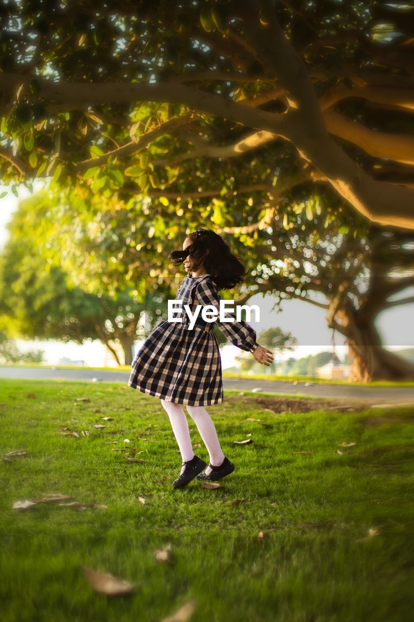Girl dancing on field