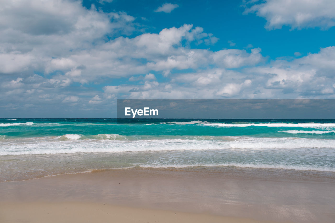 Scenic view of beach against sky