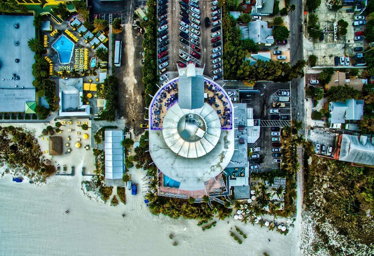 Aerial view of grand plaza hotel by beach