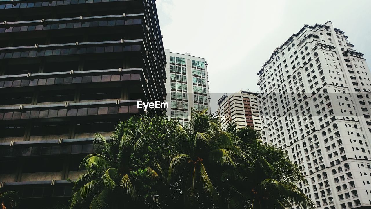 Low angle view of skyscrapers against sky