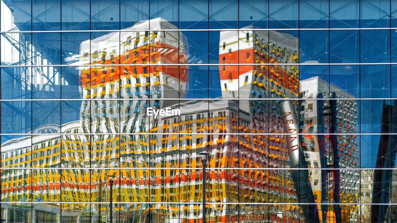 Low angle view of glass window of building