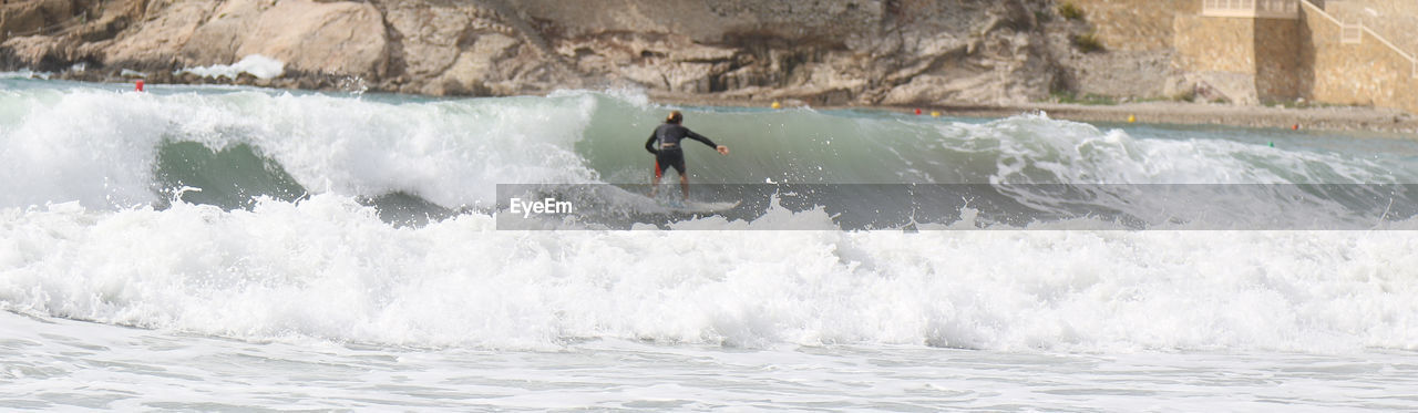 Man surfing in sea