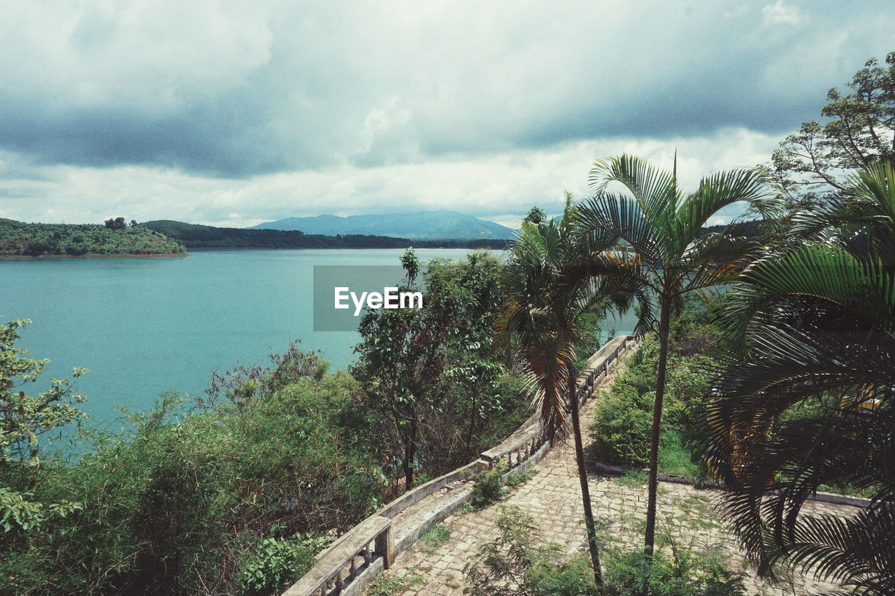 Scenic view of landscape against cloudy sky