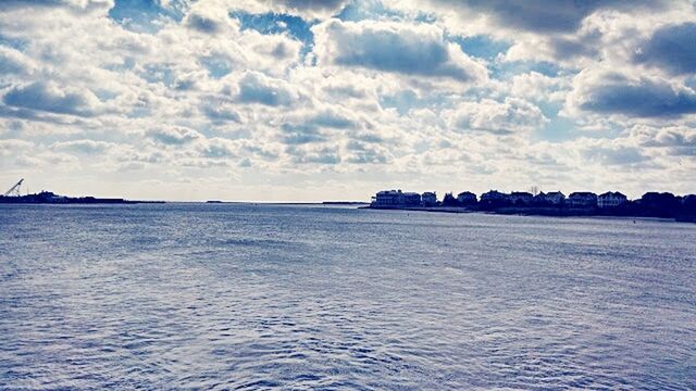 SCENIC VIEW OF SEASCAPE AGAINST CLOUDY SKY