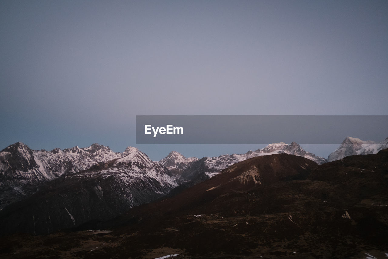 Scenic view of mountains against clear sky