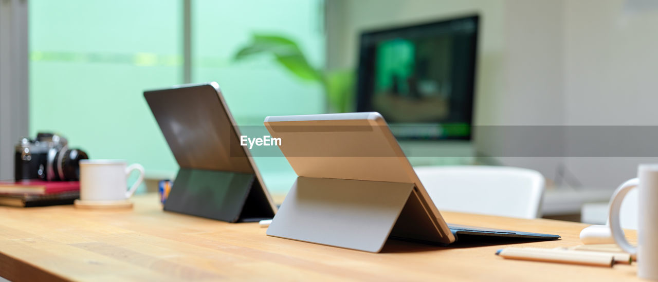 Close-up of laptop on table at office