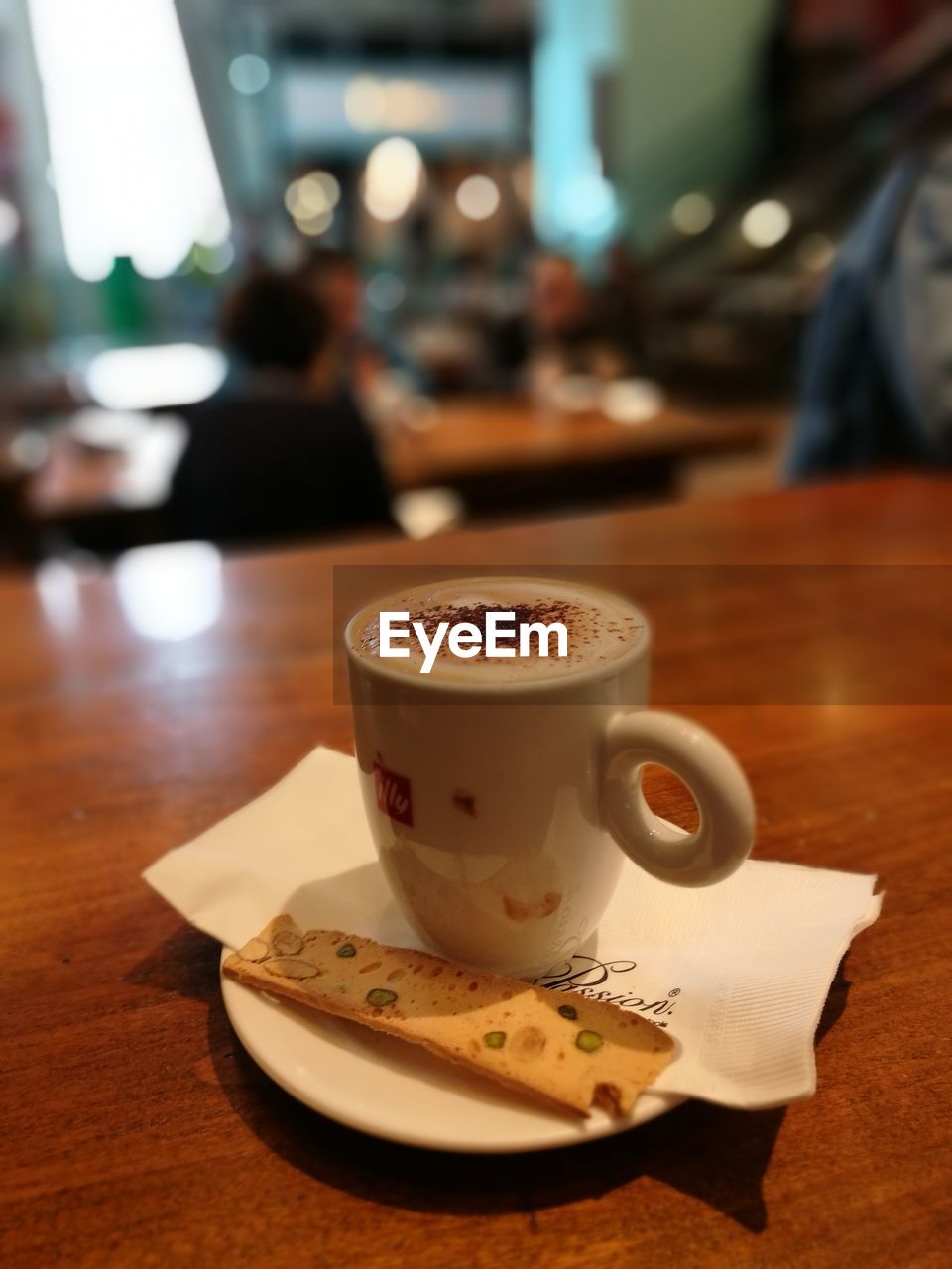 CLOSE-UP OF COFFEE ON TABLE AT CAFE