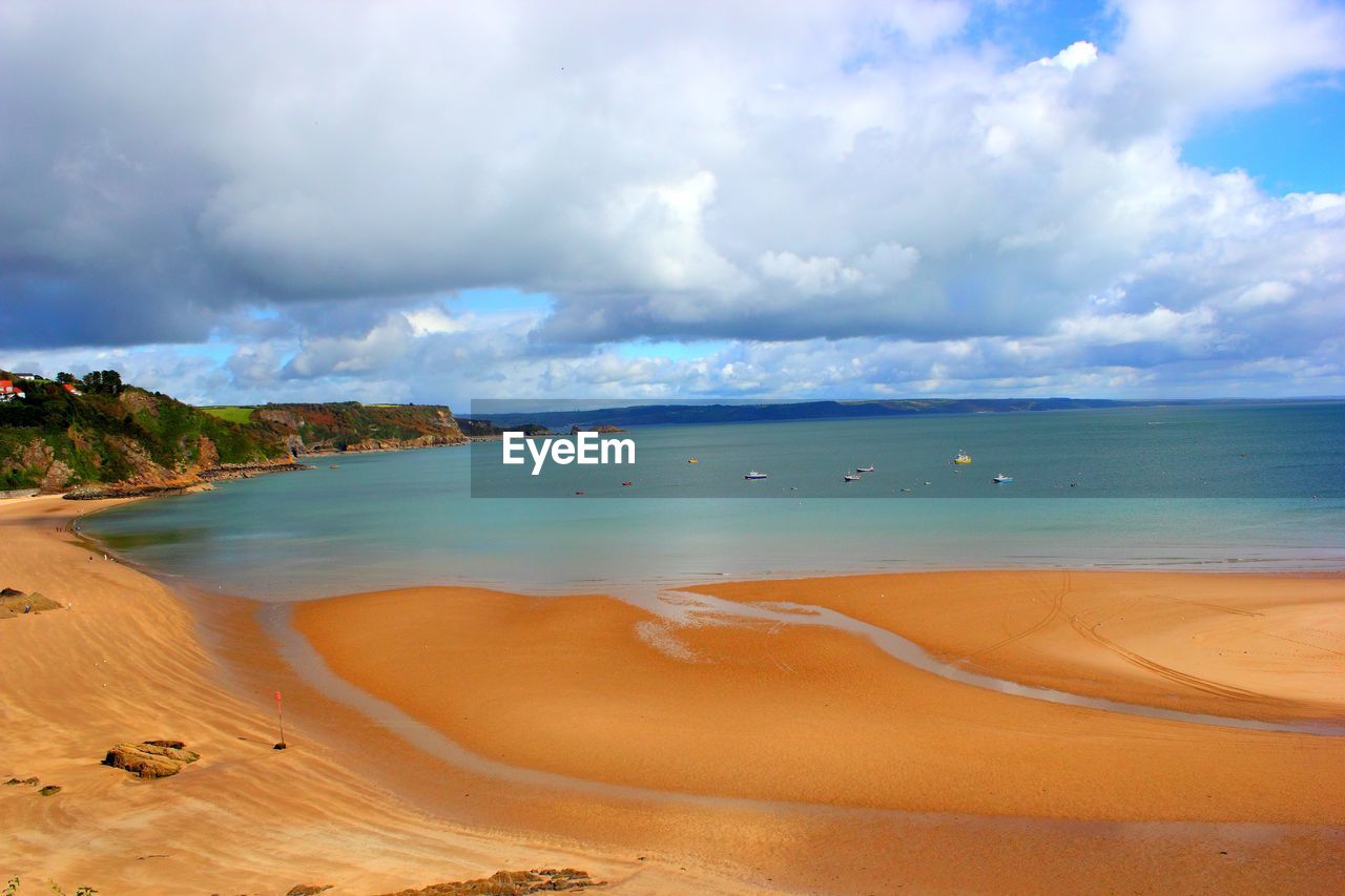 Scenic view of beach against sky