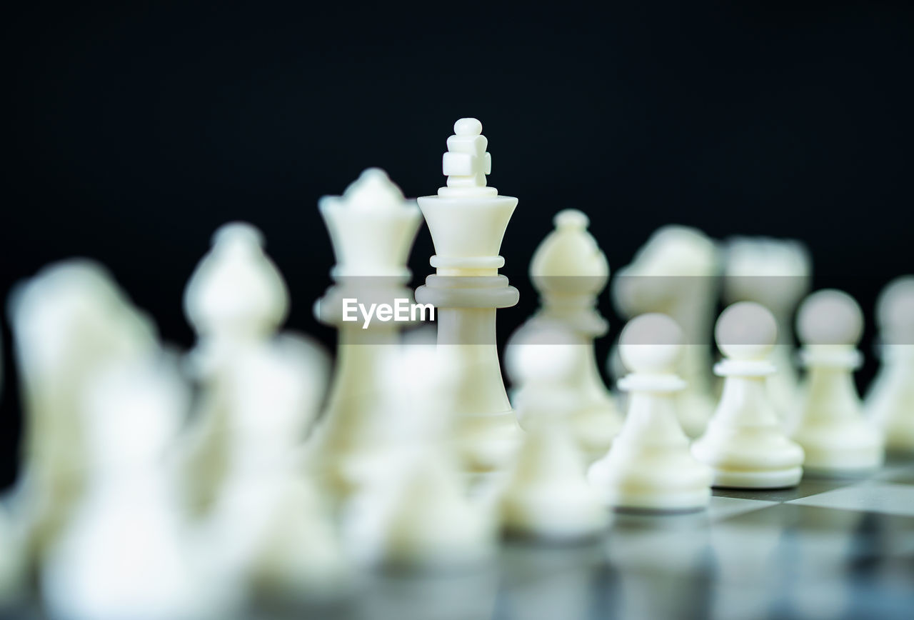 Close-up of chess pieces against blurred background