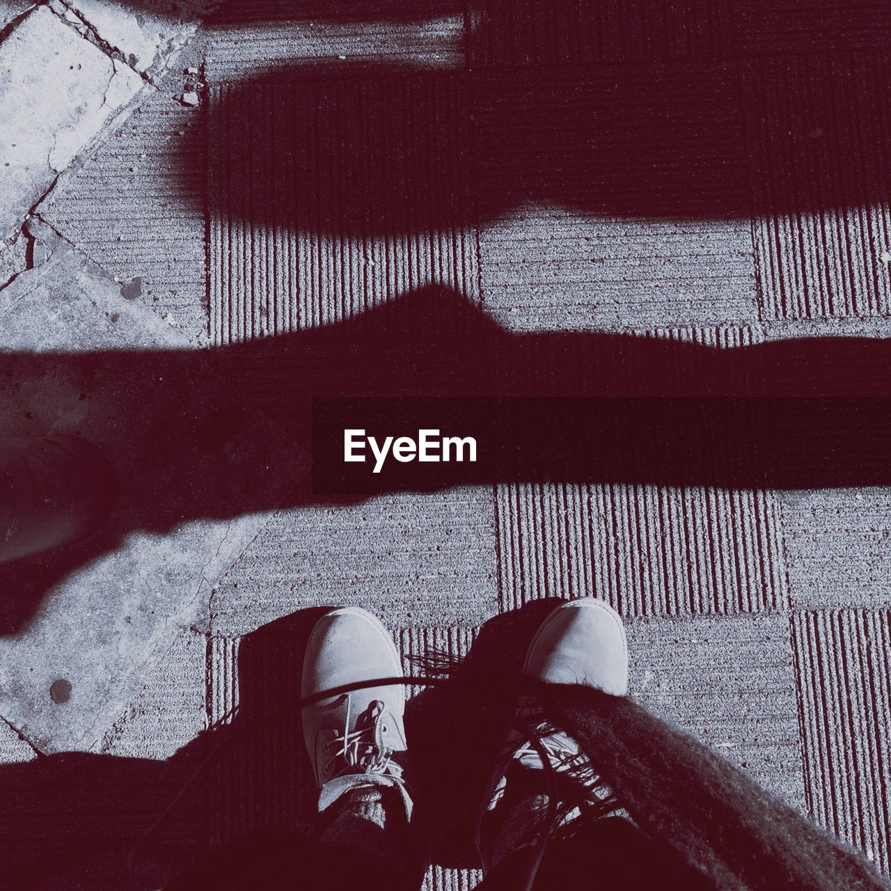Human legs and shadows