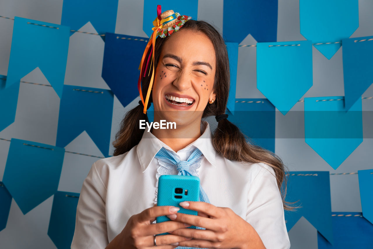 portrait of young businesswoman using mobile phone