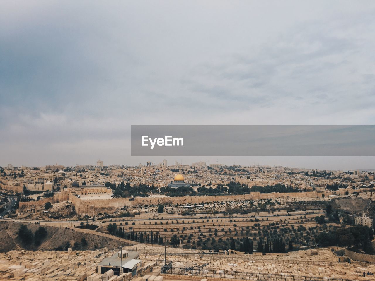 Aerial view of cityscape against sky