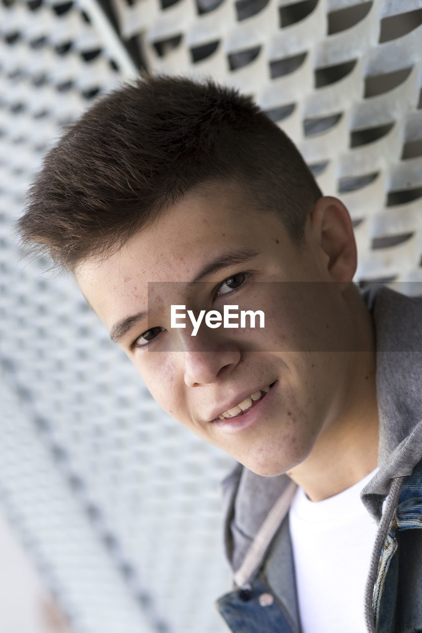 Portrait of smiling teenage boy