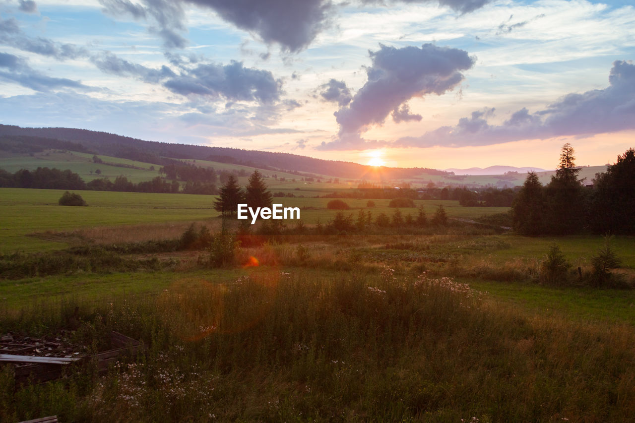 SCENIC VIEW OF LANDSCAPE DURING SUNSET