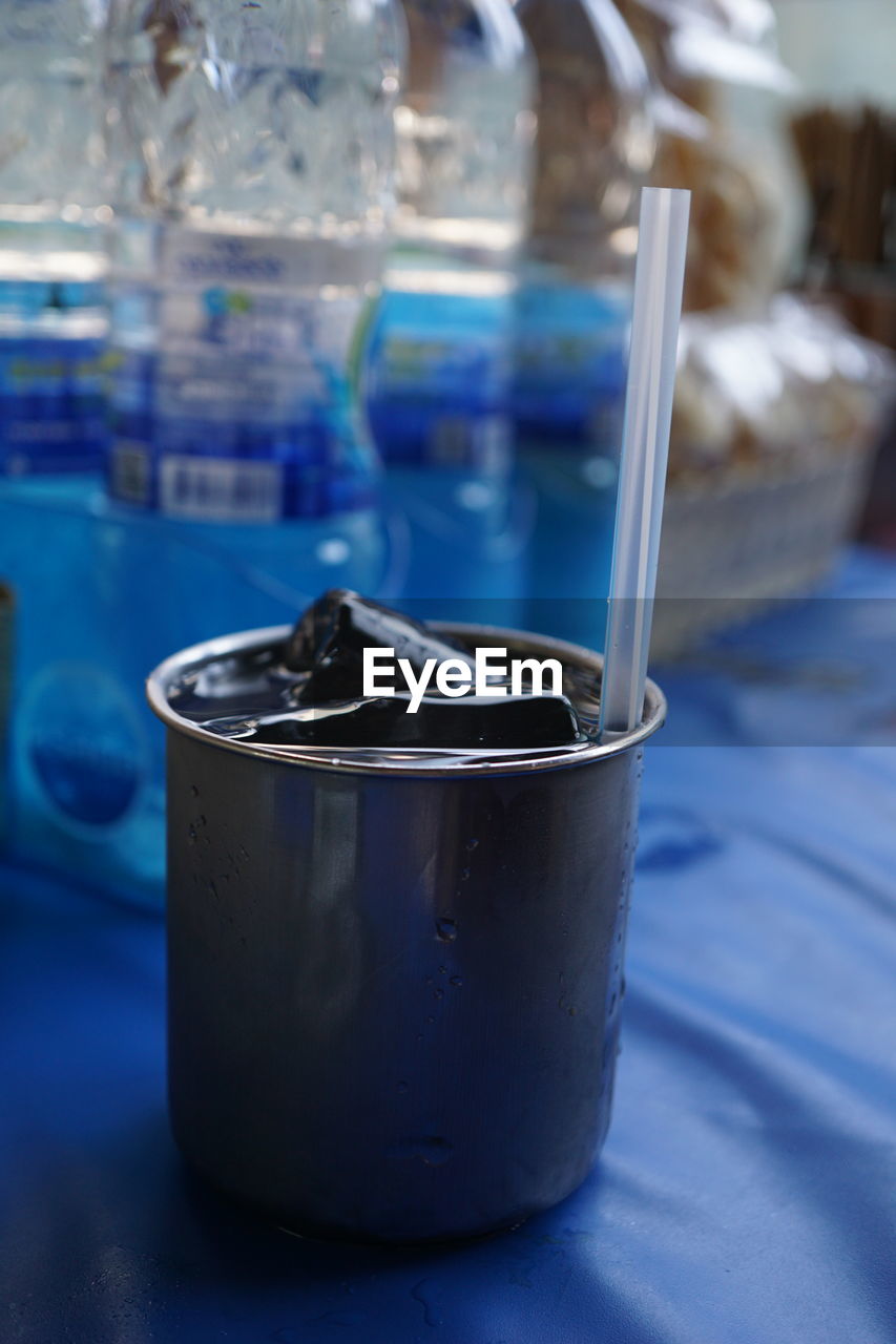 Close-up of glass of jar on table
