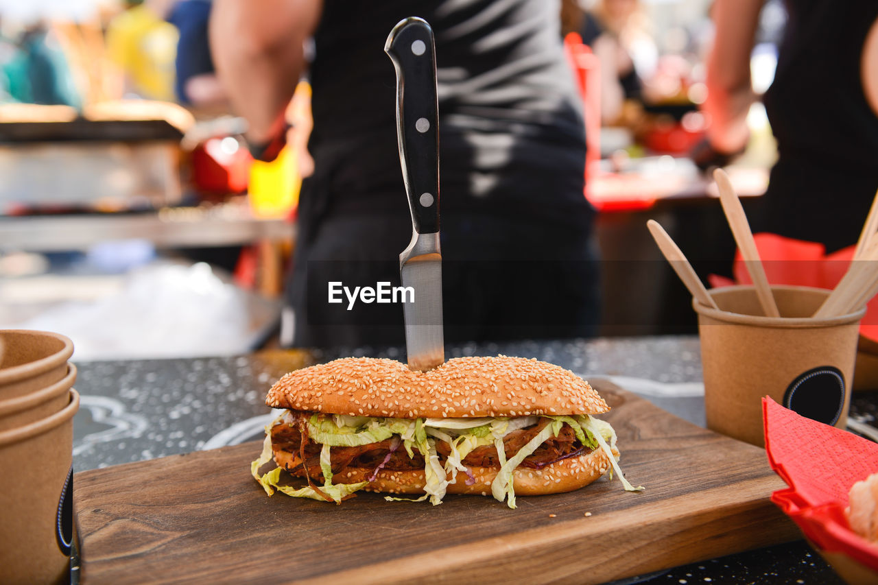 Close-up of hamburger on table