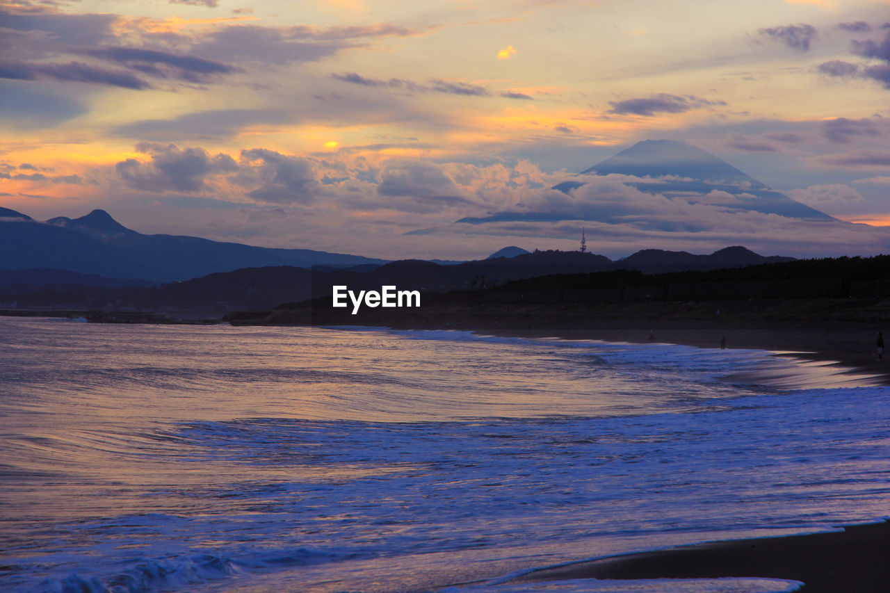 Scenic view of sea against sky during sunset