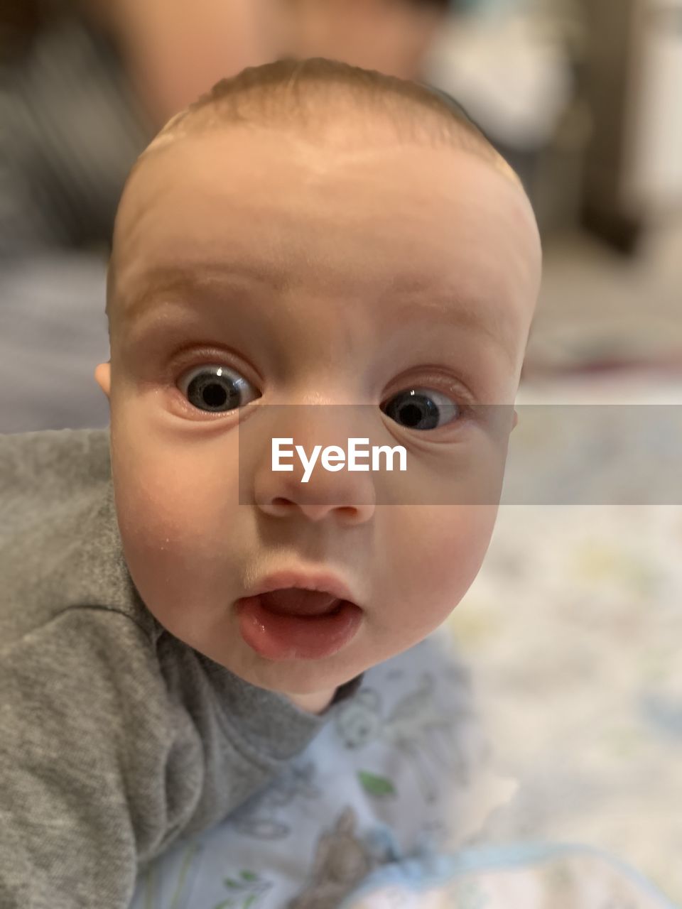 Portrait of cute baby boy at home