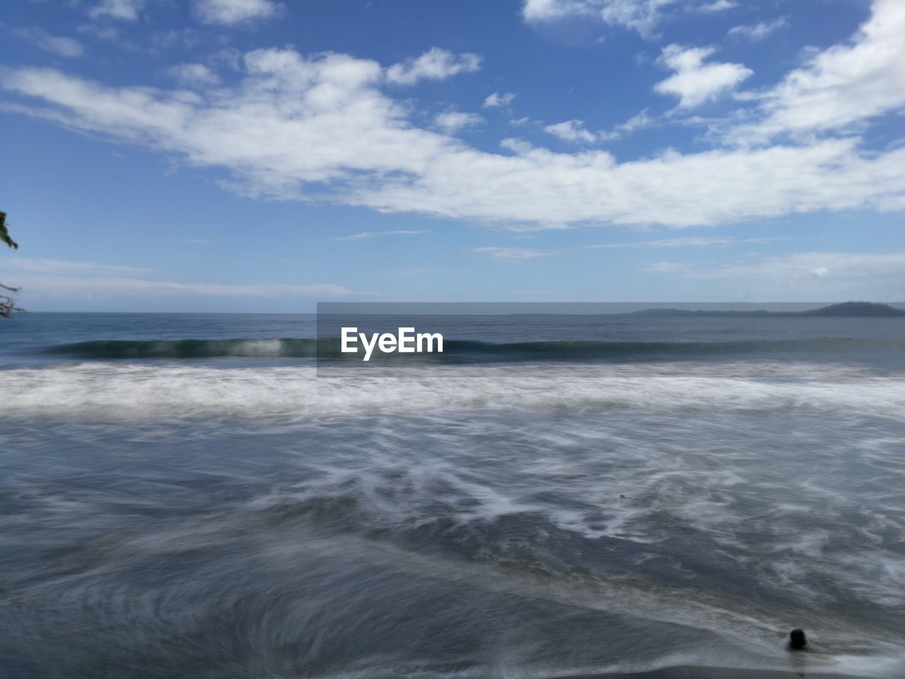 SCENIC VIEW OF SEA AND BEACH