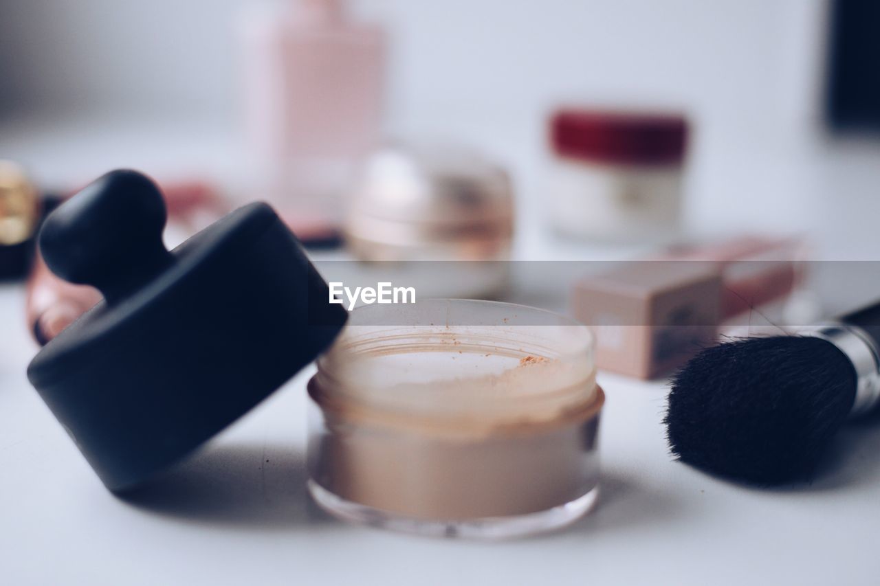 cosmetics, human eye, hand, skin, make-up, beauty product, indoors, lip, finger, make-up brush, close-up, still life, food and drink, table, focus on foreground, selective focus, body care