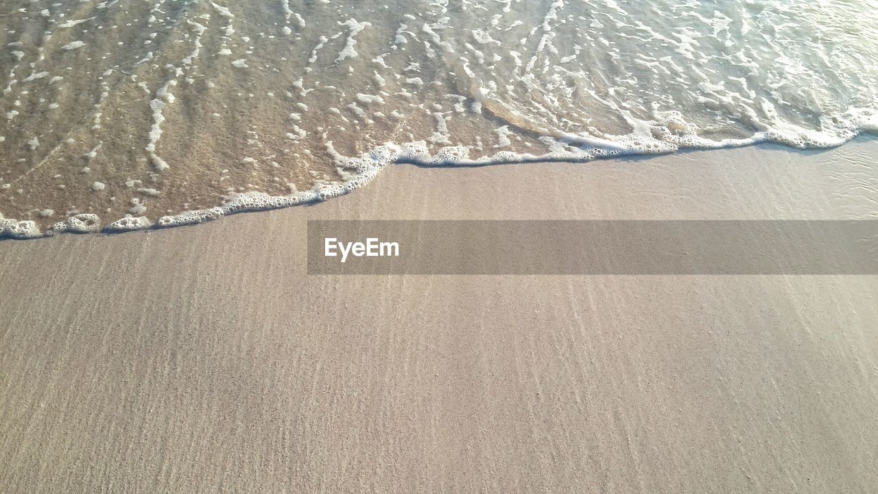 High angle view of surf at beach