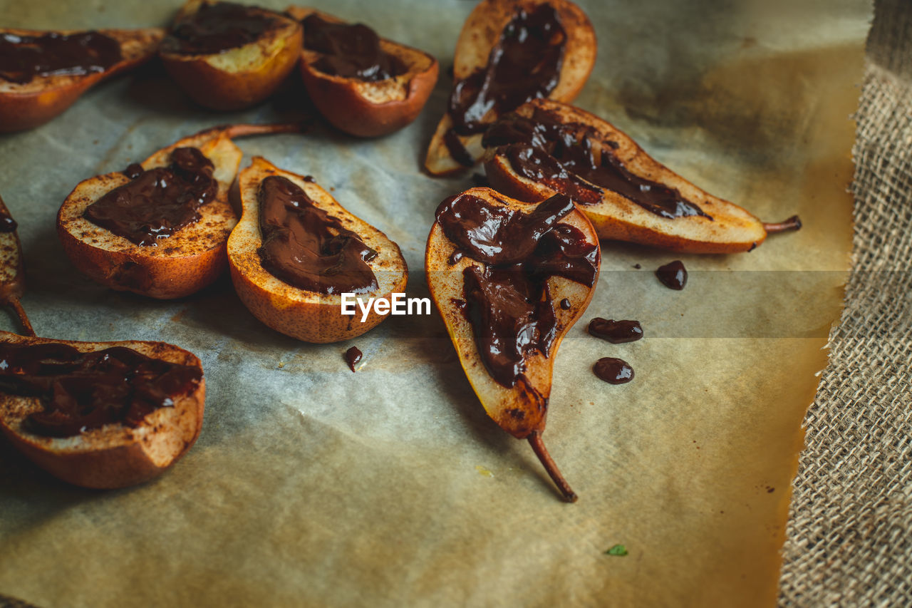 High angle view of pears with chocolate on table