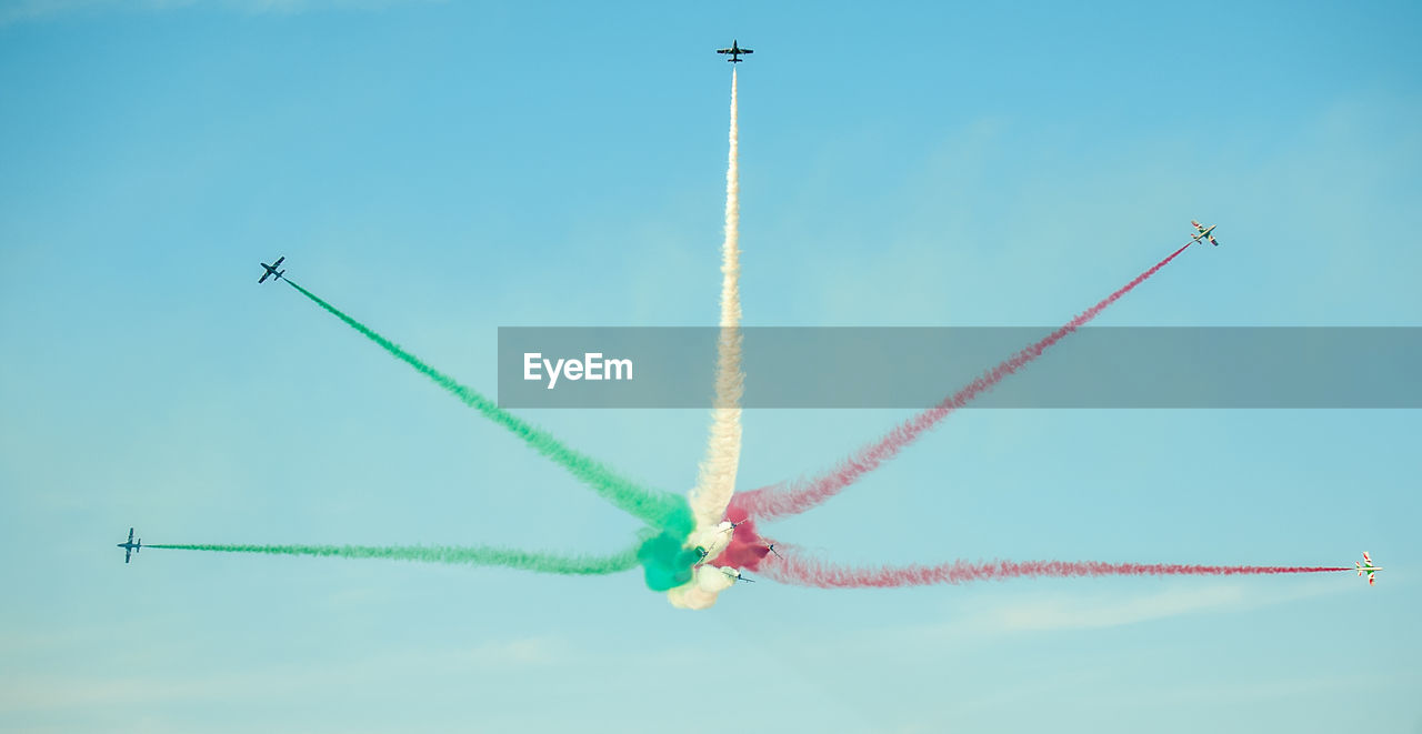Low angle view of airplane flying in sky frecce tricolori in volo su lungomare di bari 8 maggio 2019