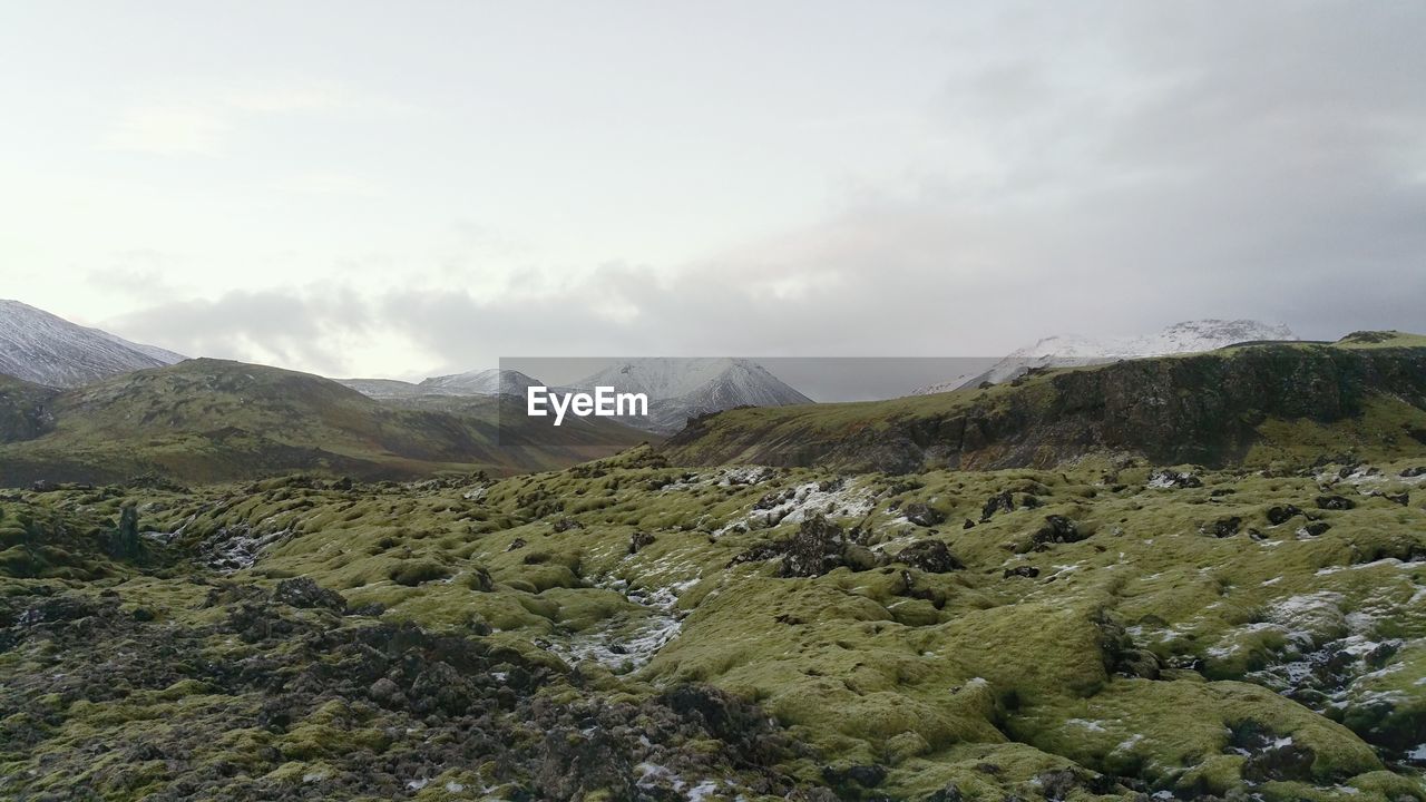 Scenic view of mountains against sky