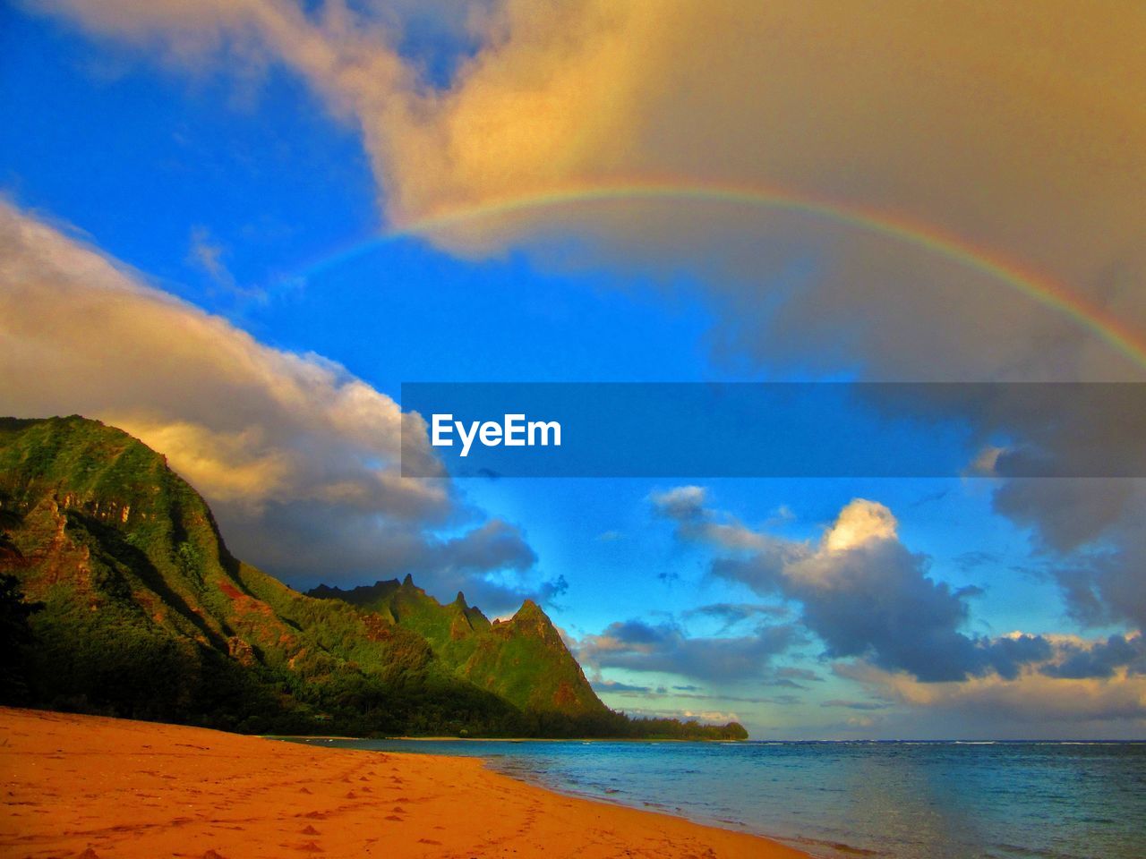 Scenic view of sea against blue sky