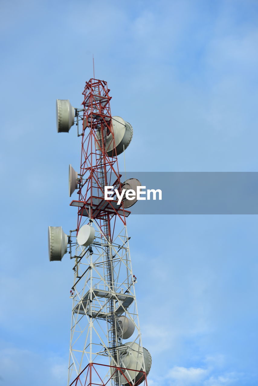 blue, sky, technology, global communications, communication, low angle view, satellite, wireless technology, satellite dish, electricity, broadcasting, cloud, telecommunications engineering, no people, telecommunications equipment, nature, antenna, communications tower, day, architecture, outdoors, lighting, vehicle, metal