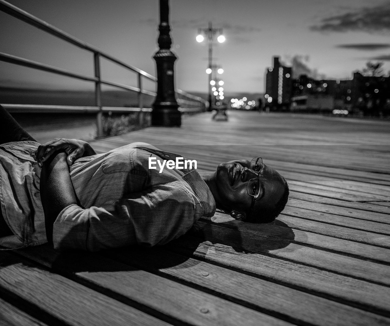 Woman relaxing on pier