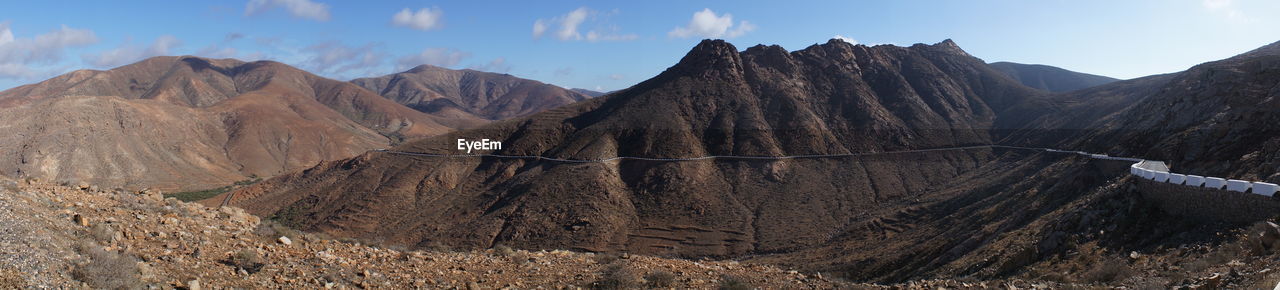 Panoramic view of mountains against sky